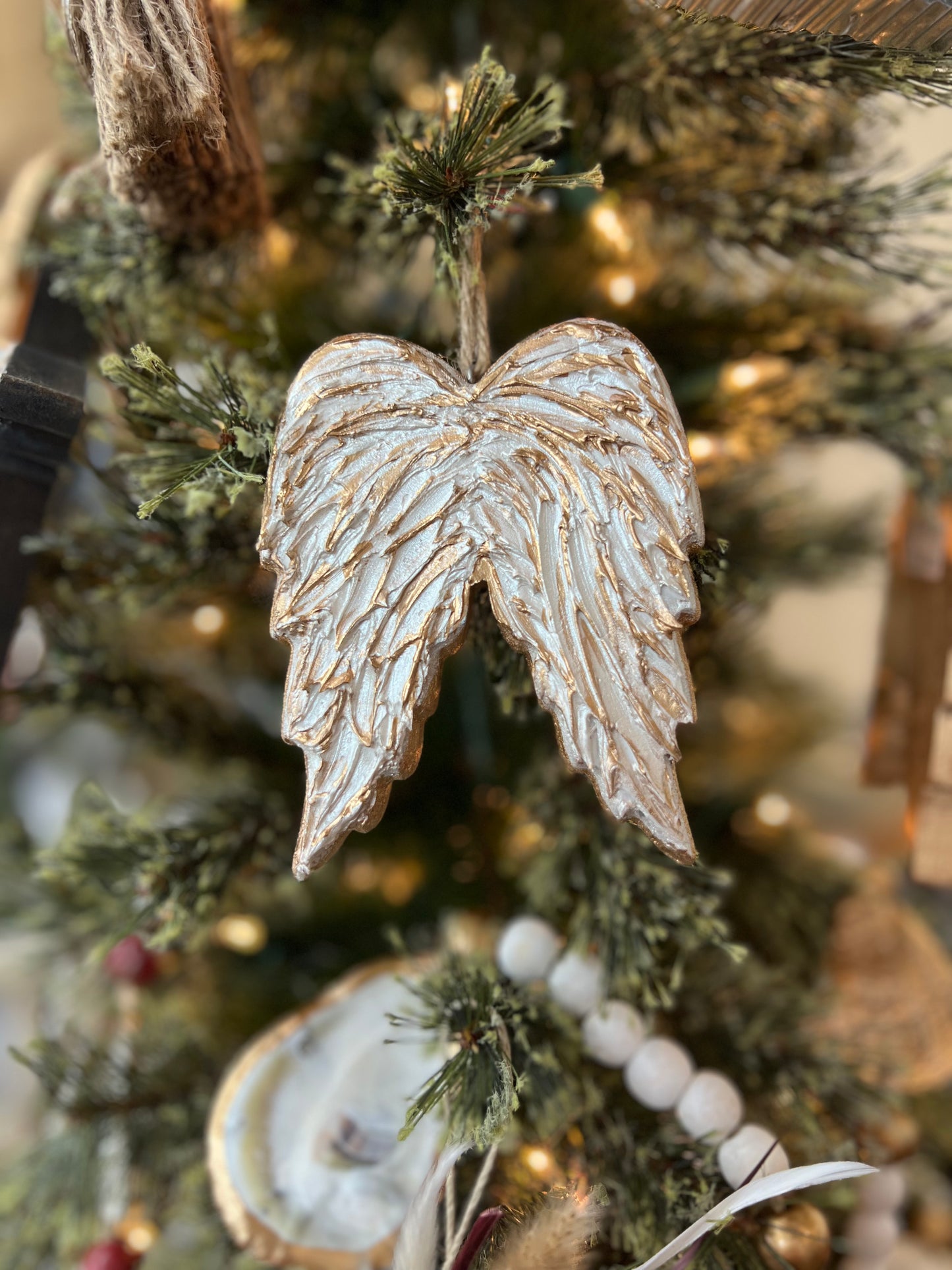 Textured wooden angel wing ornament