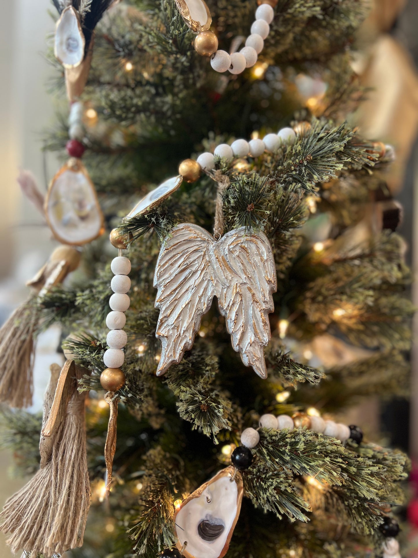 Textured wooden angel wing ornament