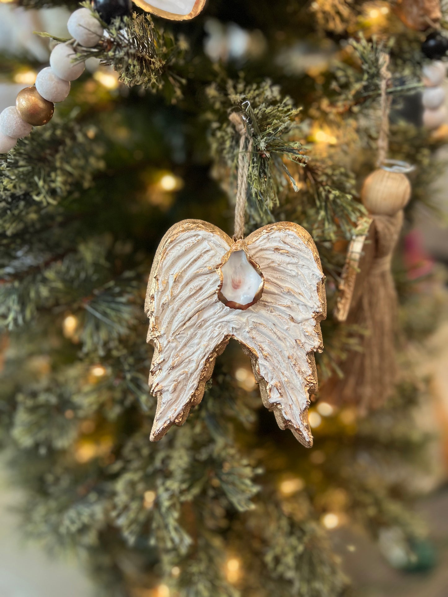 Textured wooden angel wing ornament