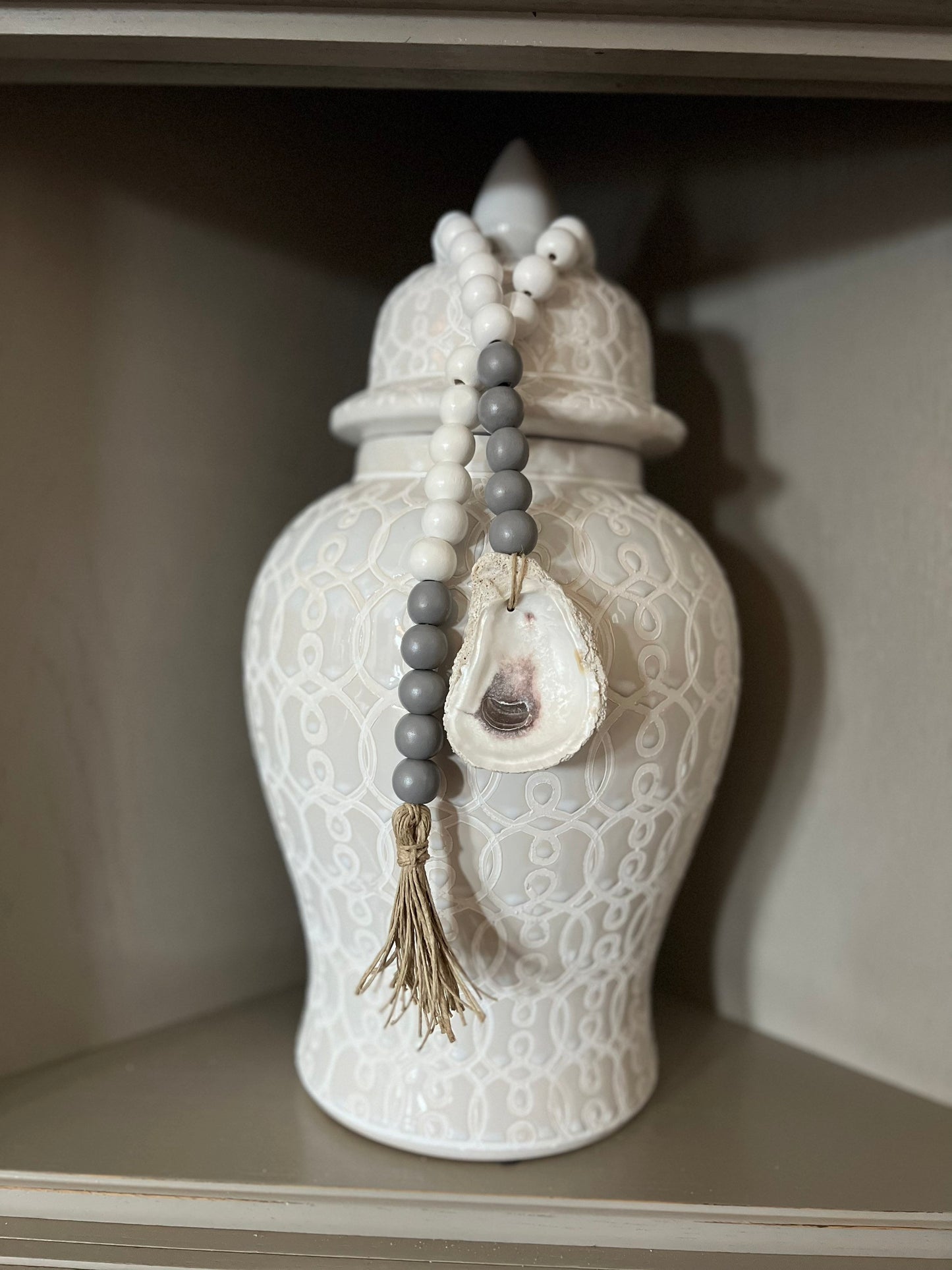 Oyster prayer beads with twine tassel