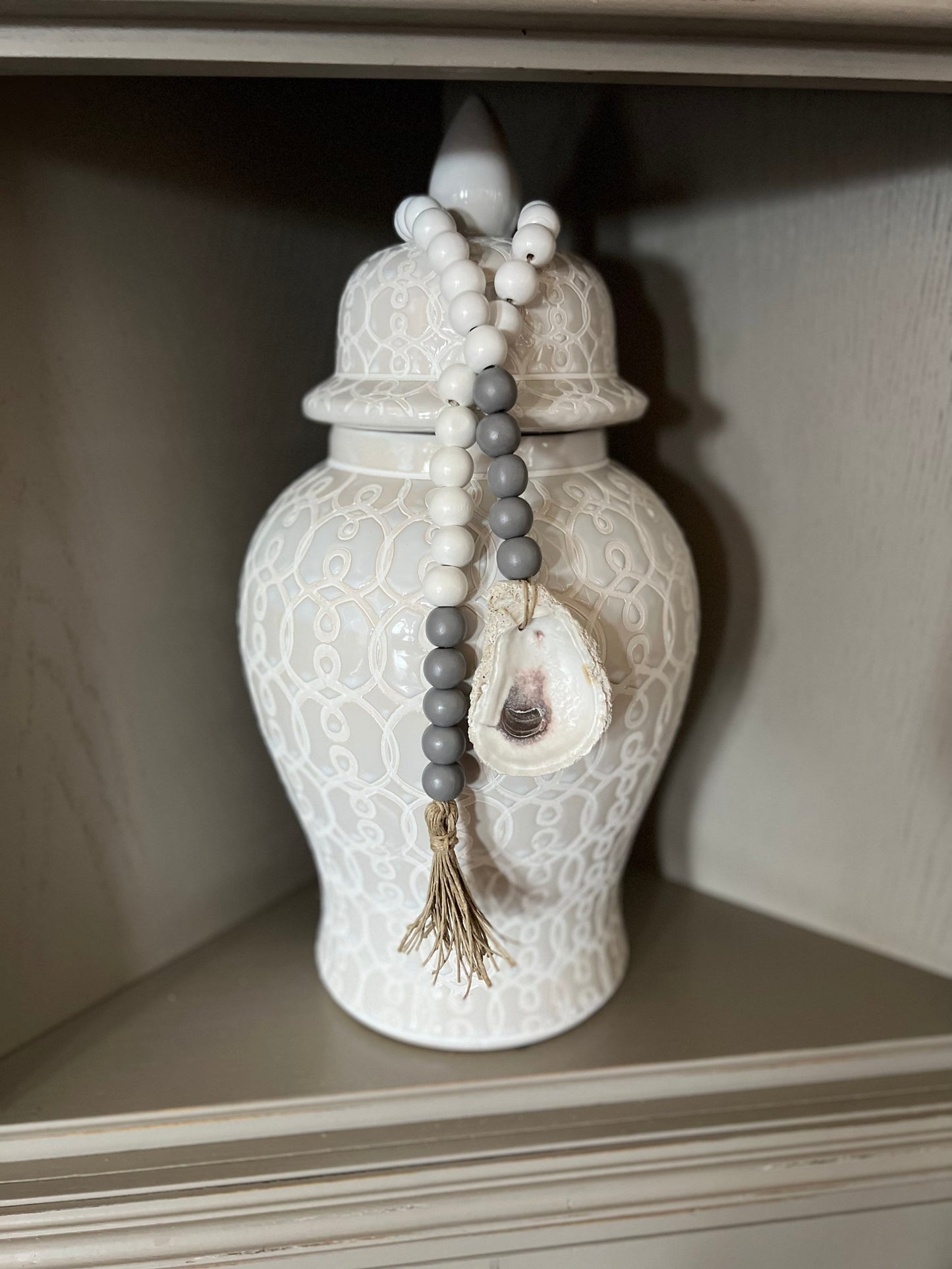 Oyster prayer beads with twine tassel