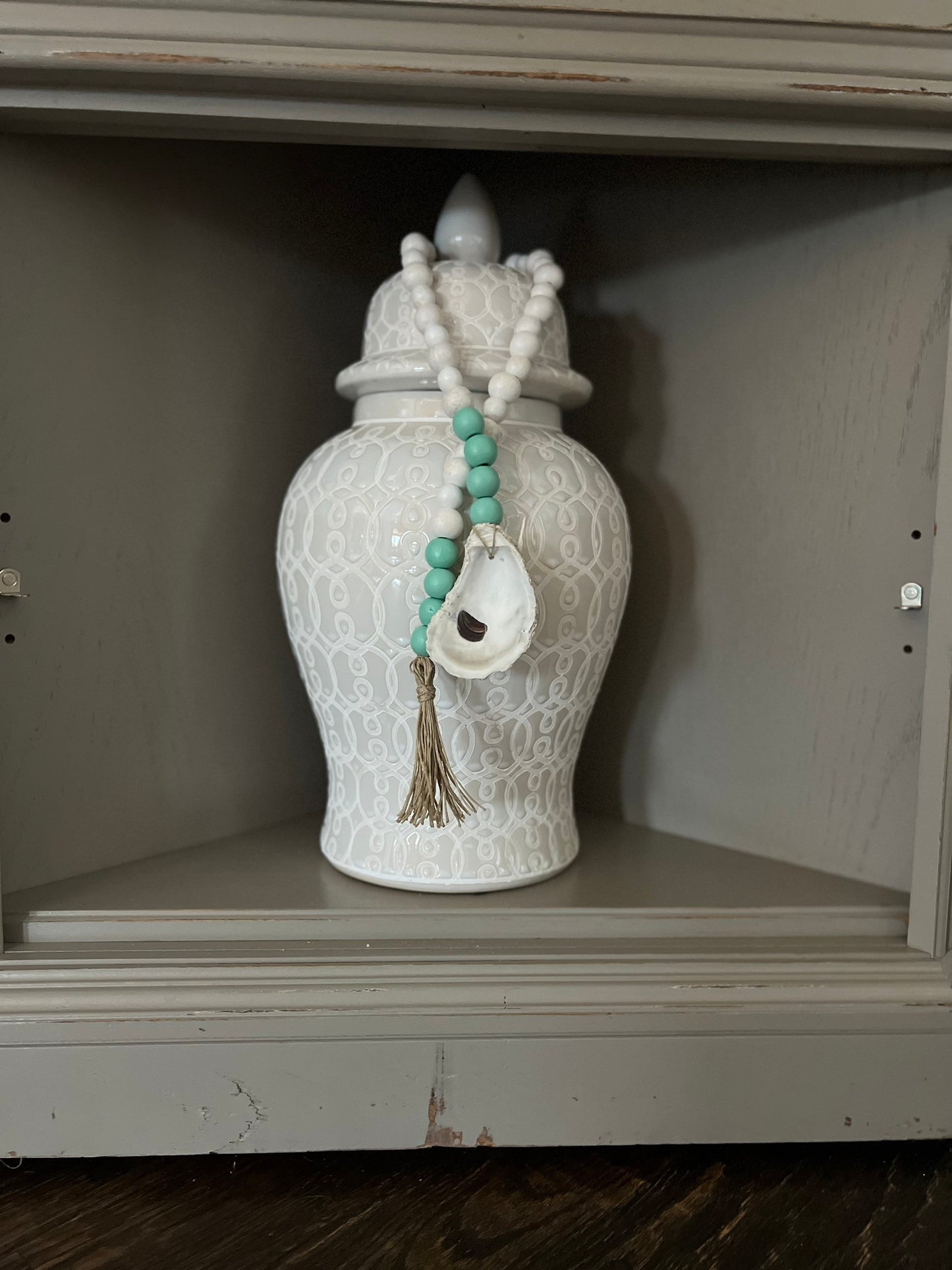 Oyster prayer beads with twine tassel